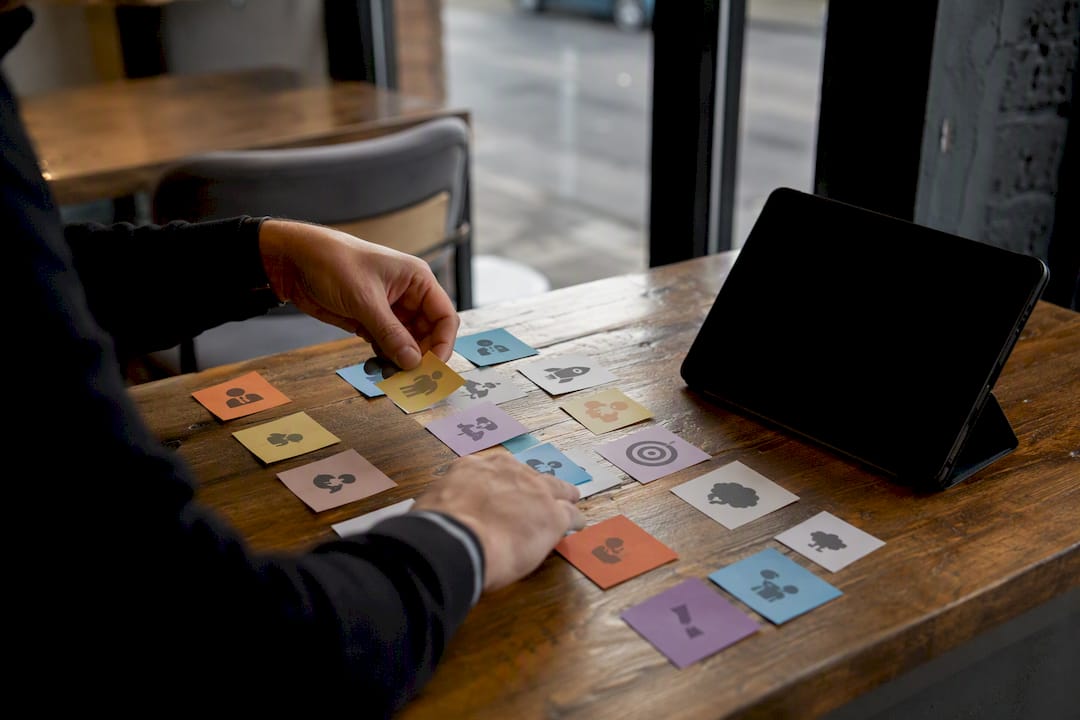Hands sorting behavioral intent signal cards